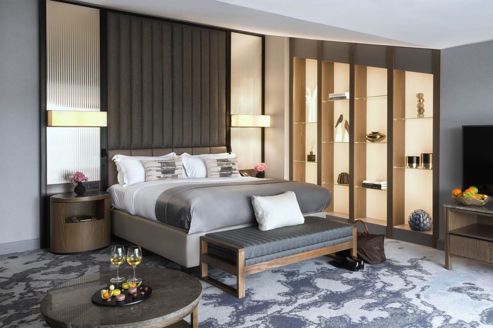 Premium bedding, down comforters, in-room safe, desk