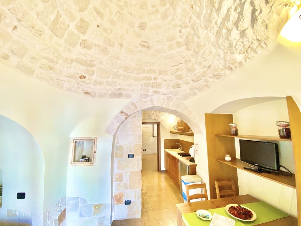 Suite, 2 Bedrooms, Bathtub (Trullo Iris) | Living area | 32-inch LCD TV with digital channels
