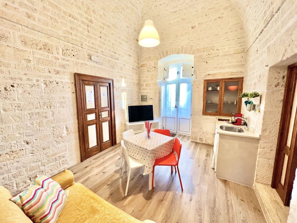 Comfort Apartment, 2 Bedrooms, Kitchenette (Trullo Girasole) | Living area | 32-inch LCD TV with digital channels