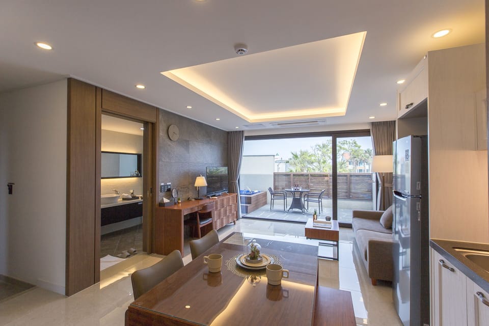 Premier Spa & Terrace | Living area | Flat-screen TV, heated floors