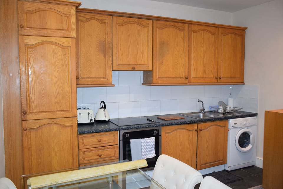 Deluxe Apartment, 2 Bedrooms | Private kitchen | Full-size fridge, microwave, oven, stovetop
