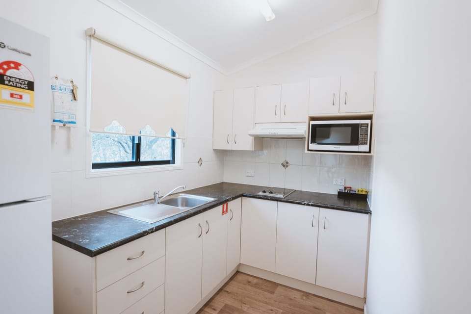 Hillside Villa 1/8 | Private kitchen | Fridge, microwave, stovetop, electric kettle
