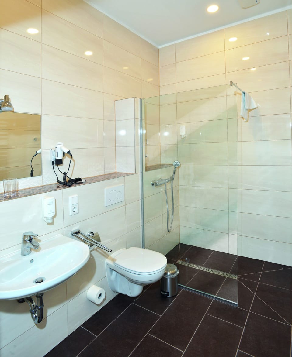 Shower, free toiletries, hair dryer, towels