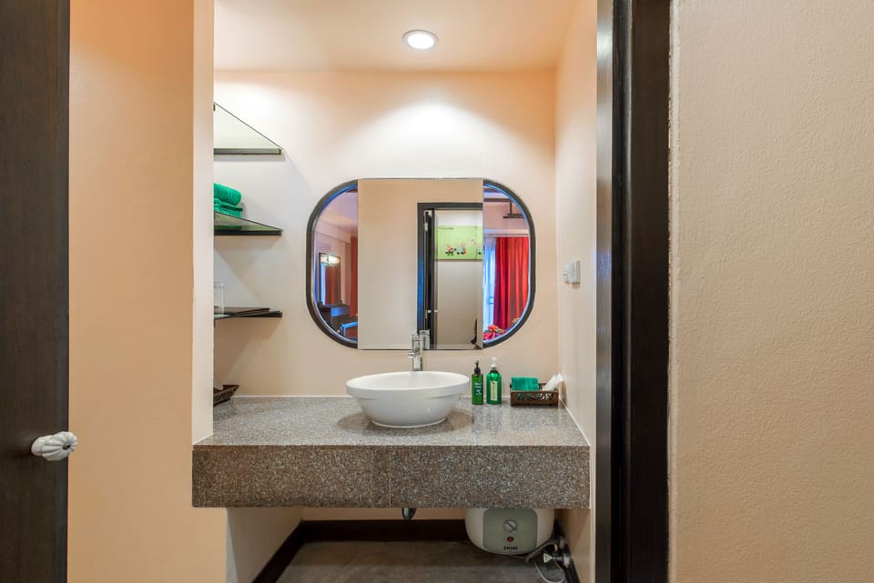 Deluxe Room, Pool Access | Bathroom sink