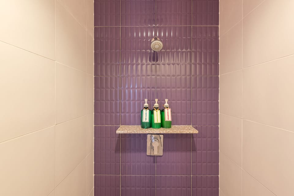 Deluxe Room, Pool Access | Bathroom shower