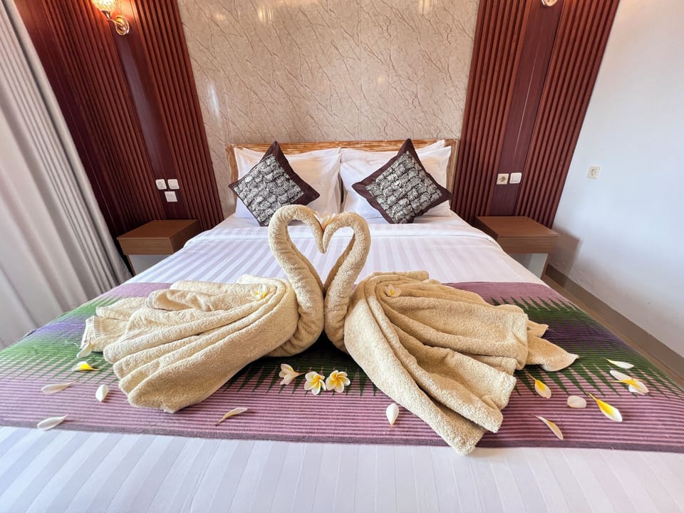 Deluxe Double or Twin Room, Pool View | In-room safe, desk, laptop workspace, blackout drapes