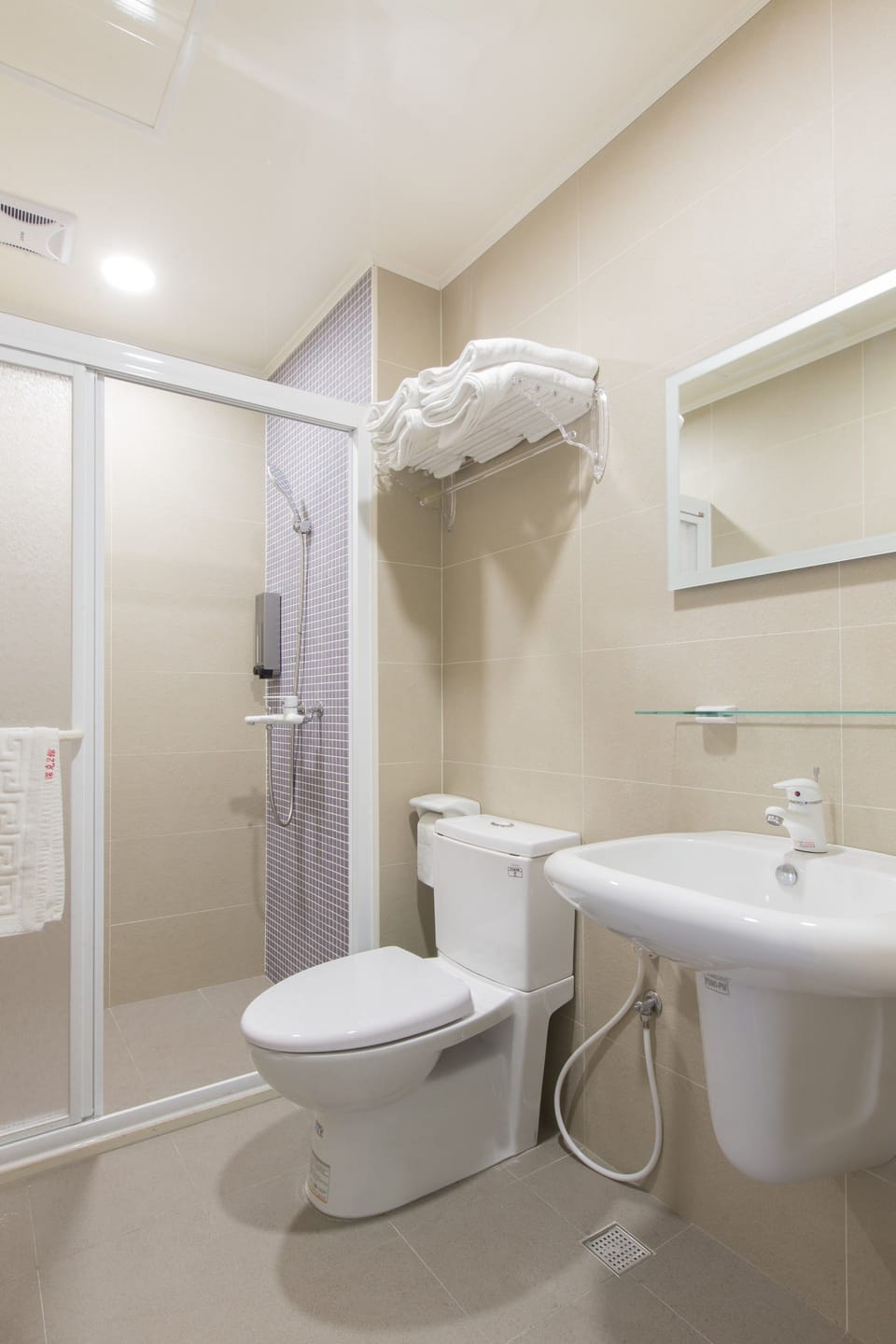 Shower, free toiletries, hair dryer, slippers