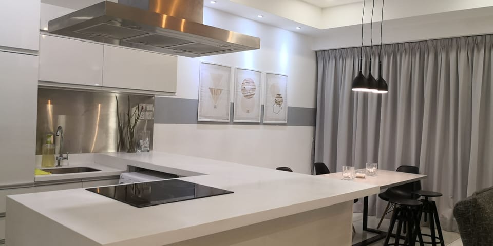 Premium Condo, 2 Bedrooms, Refrigerator & Microwave, Garden View | Living area | 43-inch Smart TV with digital channels, TV, Netflix
