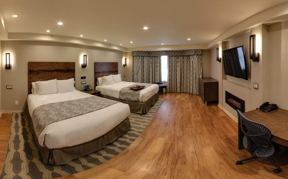 Deluxe Room, 2 Queen Beds (Two Queen Bed Non-Smoking Room) | Premium bedding, down comforters, pillowtop beds, in-room safe