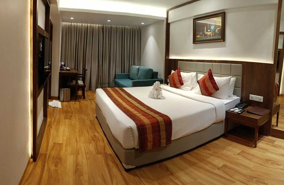 Premium Deluxe Room | In-room safe, desk, iron/ironing board