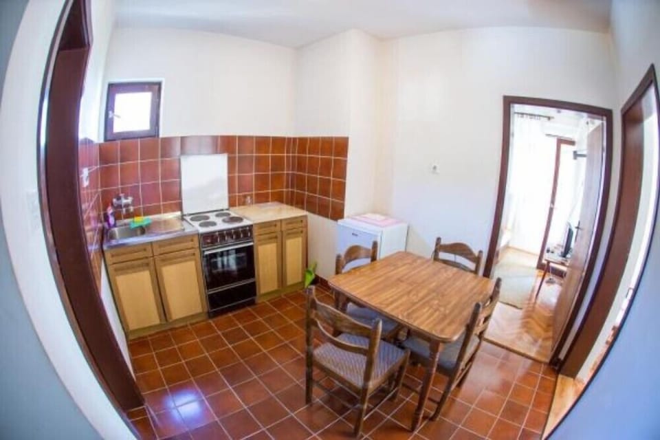 Family Apartment, 2 Bedrooms | Private kitchen | Fridge, electric kettle