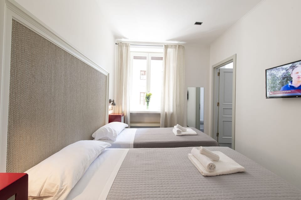 Standard Double or Twin Room | Minibar, in-room safe, desk, soundproofing