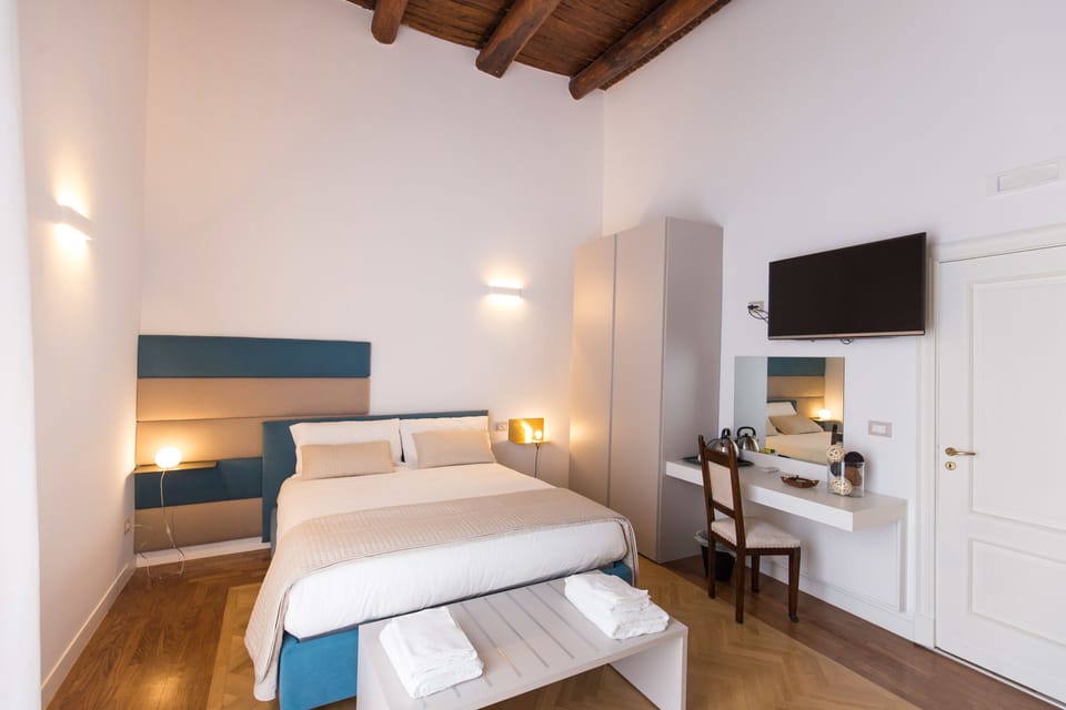 Traditional Triple Room, City View | Down comforters, memory foam beds, minibar, in-room safe