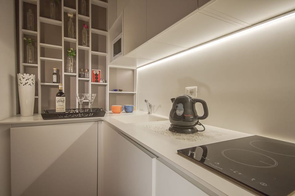 Apartment, 1 Bedroom | Private kitchen | Full-size fridge, microwave, stovetop, dishwasher