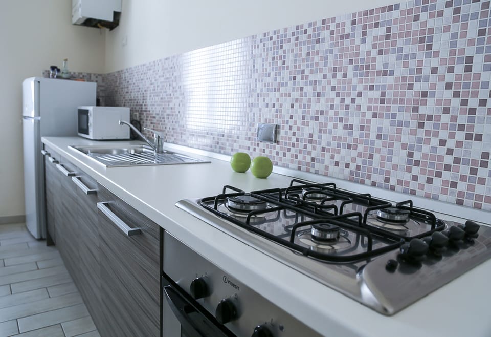 Apartment, 2 Bedrooms | Private kitchen | Full-size fridge, microwave, oven, stovetop