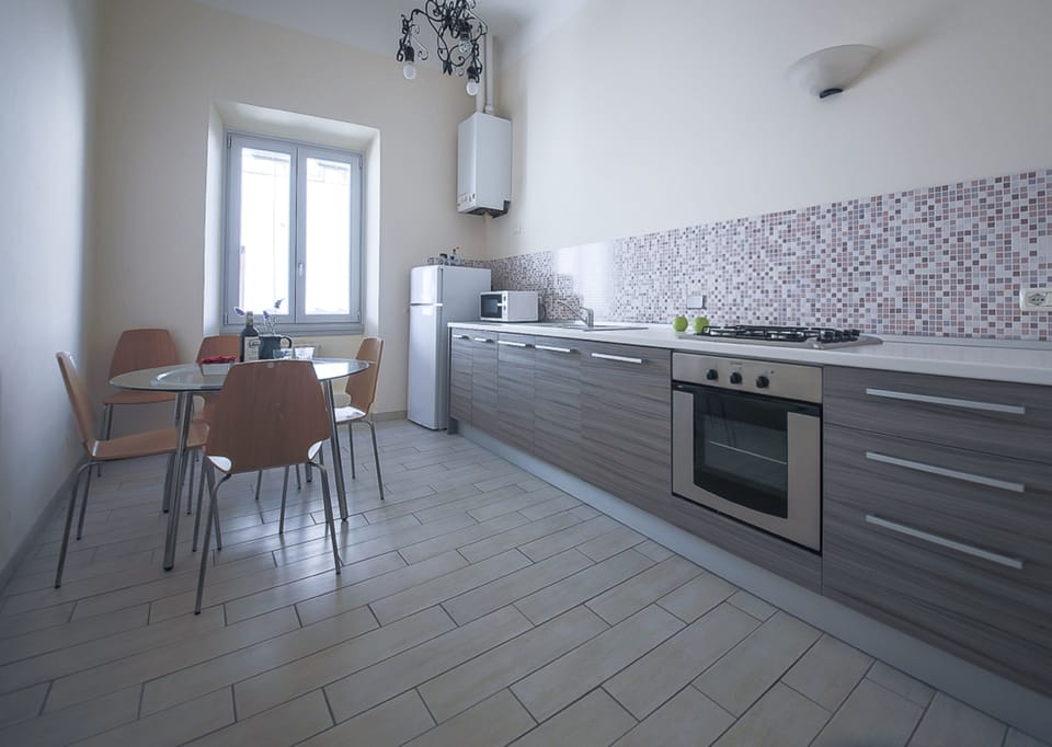 Apartment, 2 Bedrooms | Private kitchen | Full-size fridge, microwave, oven, stovetop