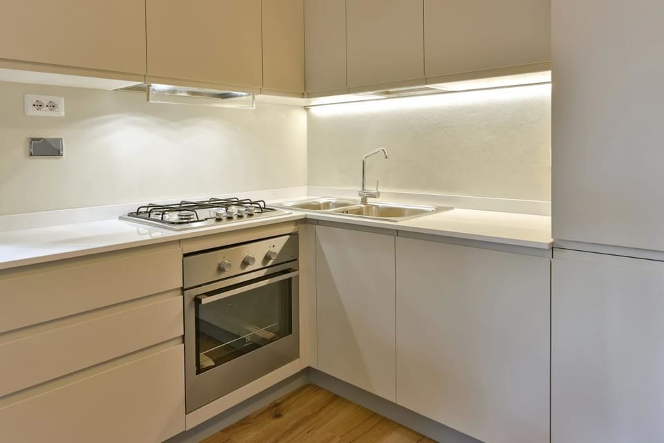 Apartment, 2 Bedrooms | Private kitchen | Full-size fridge, oven, stovetop, cookware/dishes/utensils