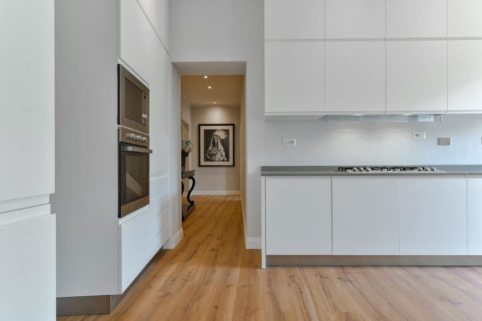 Apartment, 4 Bedrooms | Private kitchen | Full-size fridge, microwave, oven, stovetop