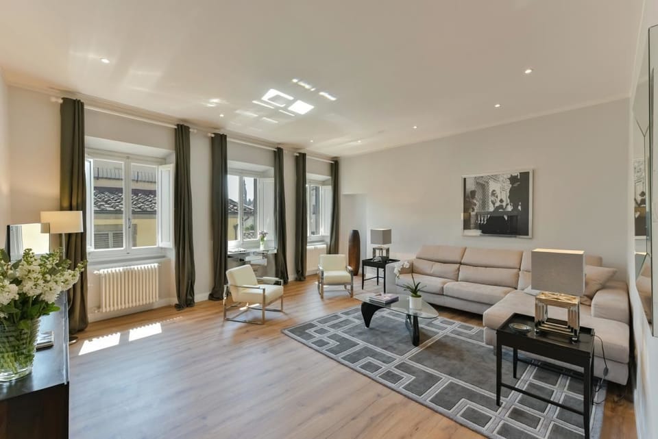 Apartment, 4 Bedrooms | Living area | Flat-screen TV