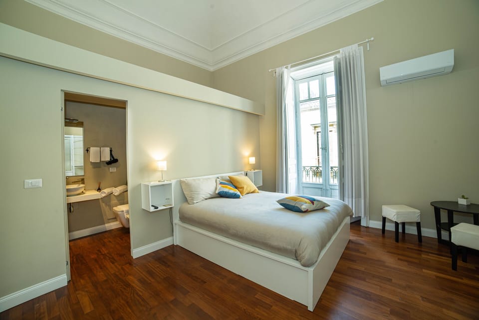Premium bedding, memory foam beds, minibar (some free items), desk