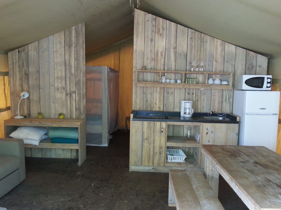 Cottage (Safari Lodges) | Private kitchenette | Fridge, stovetop, highchair, cookware/dishes/utensils