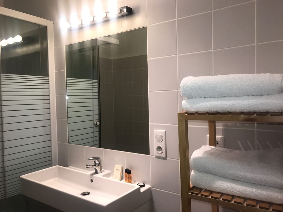 Shower, deep soaking tub, free toiletries, hair dryer