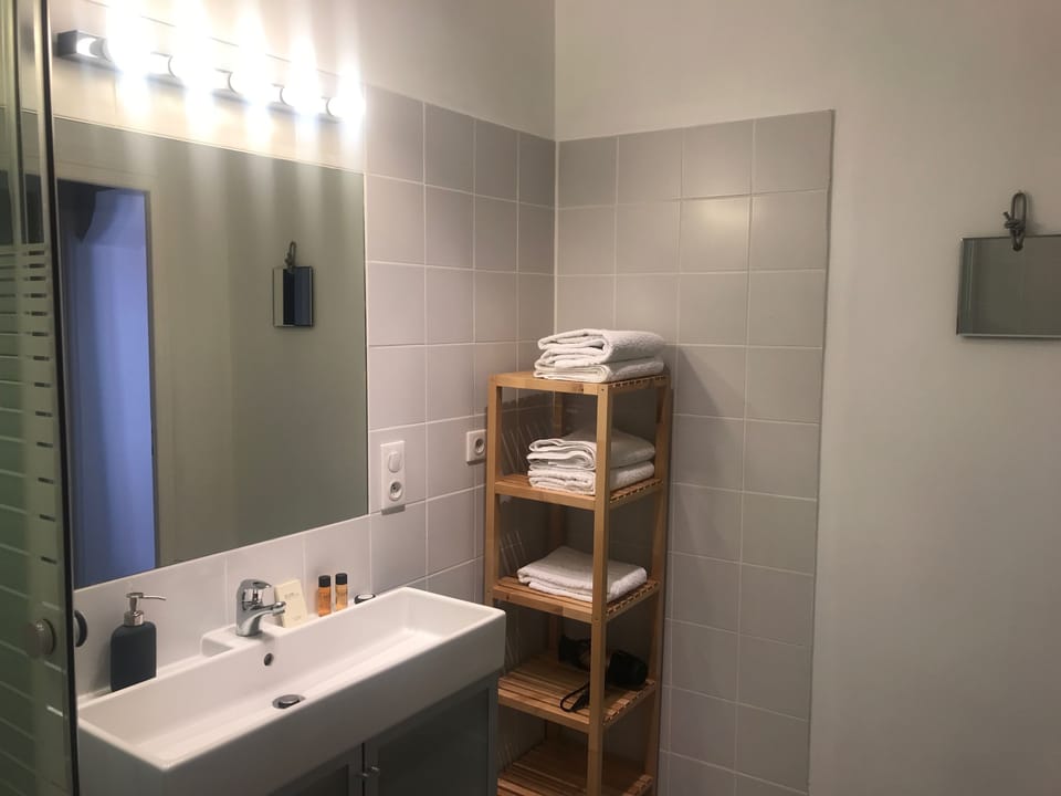 Shower, deep soaking tub, free toiletries, hair dryer