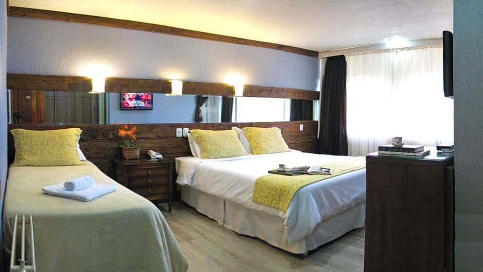 Deluxe Triple Room | Minibar, free WiFi