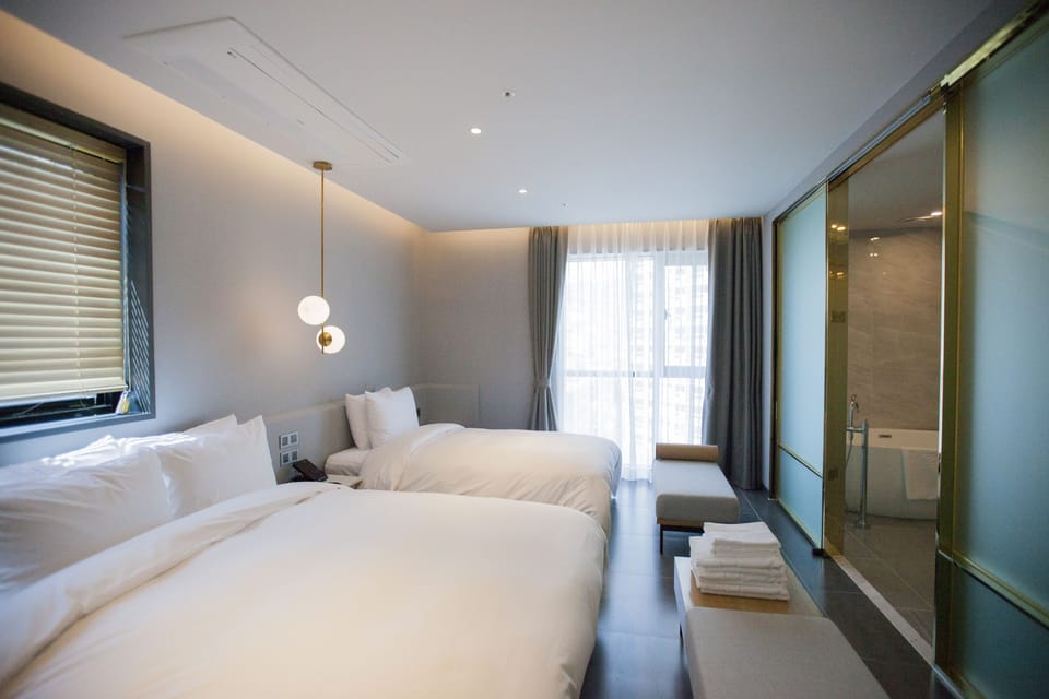 Family Twin Room, City View | Premium bedding, in-room safe, desk, blackout drapes