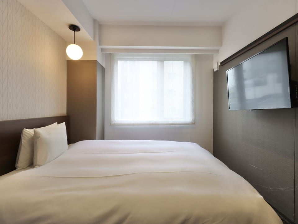 Queen Room | In-room safe, blackout drapes, iron/ironing board, free WiFi