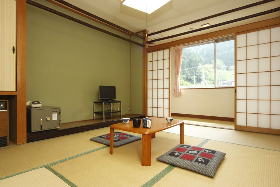Japanese Style Room with Shared Bathroom | In-room safe, desk, laptop workspace, iron/ironing board (on request)
