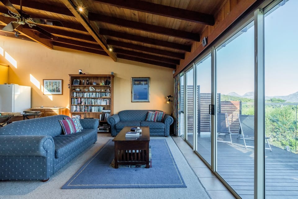 Deluxe 4 Bedroom House with Tri-Bunk Bed and Beach Views | Living area | Flat-screen TV, DVD player