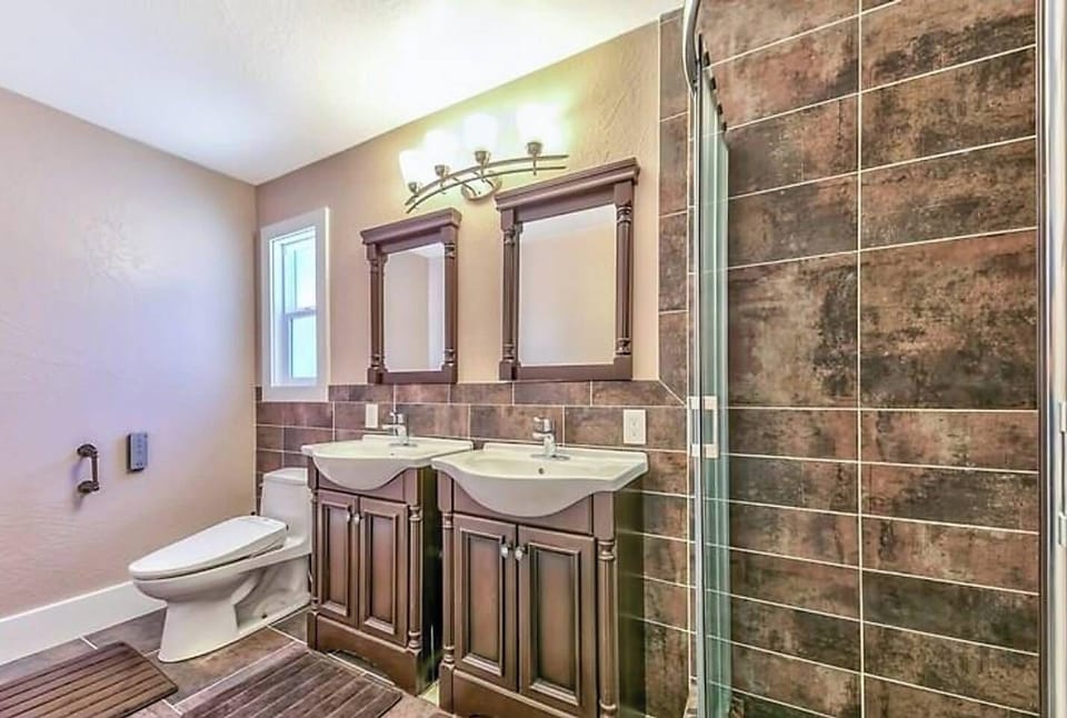 Second floor Private Jr Master Bathroom Hydronic heated floor and heated toilet