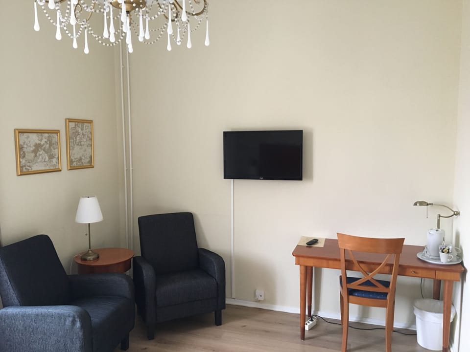 Standard Twin Room, Private Bathroom | Living area | Flat-screen TV
