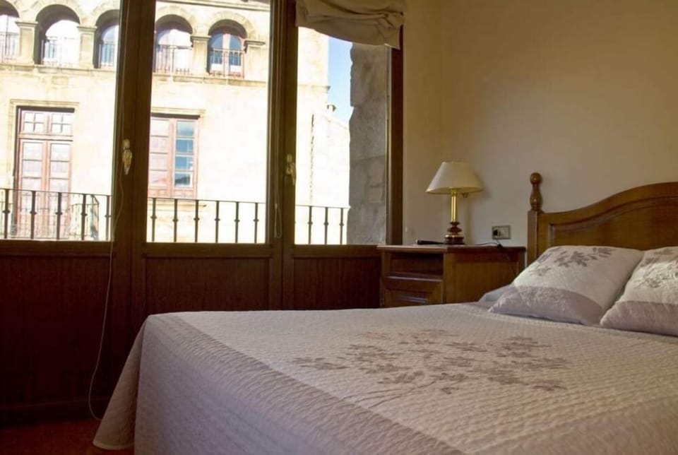 Double or Twin Room | Minibar, desk, iron/ironing board, free WiFi