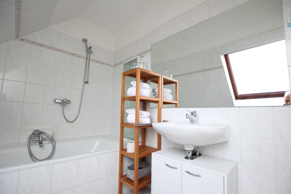 Shower, rainfall showerhead, eco-friendly toiletries, hair dryer