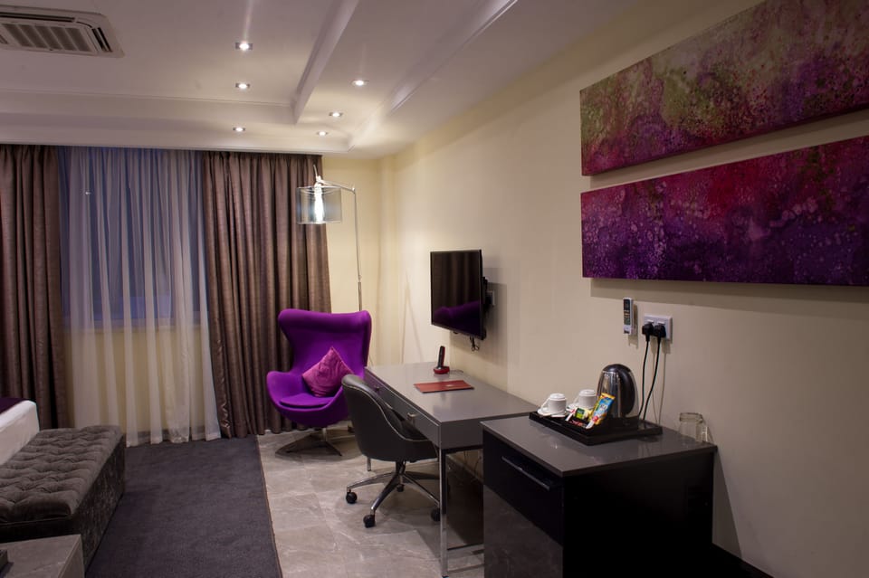 Executive Room | Memory foam beds, minibar, in-room safe, desk