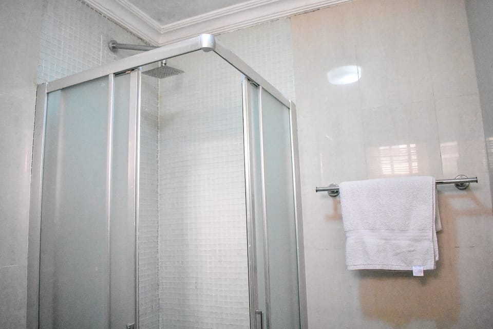 Deep soaking tub, rainfall showerhead, free toiletries, towels