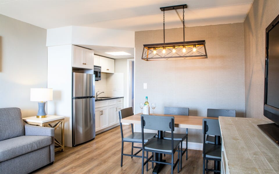 Family Suite, 1 Bedroom, Kitchenette, Ocean View | Living area | 40-inch flat-screen TV with cable channels, TV