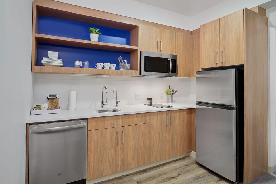 Executive Suite, 1 King Bed with Sofa bed | Private kitchen | Coffee/tea maker, fridge, microwave