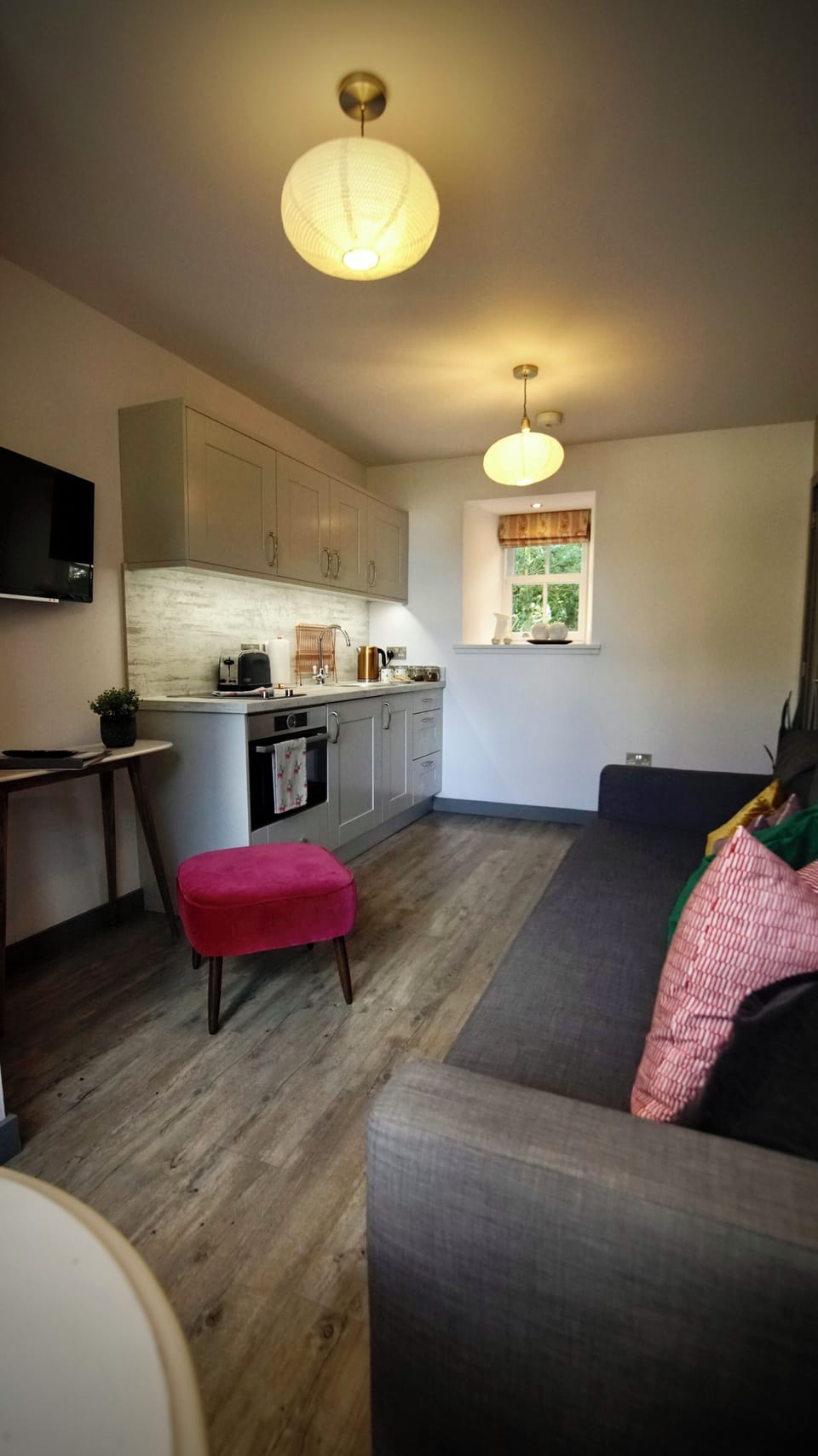 1-Bedroom Lodge (Ramsay) | Living area | 22-inch Smart TV with digital channels, heated floors