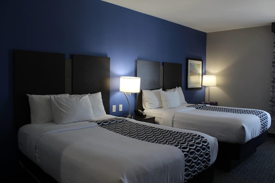Premium bedding, down comforters, laptop workspace, iron/ironing board