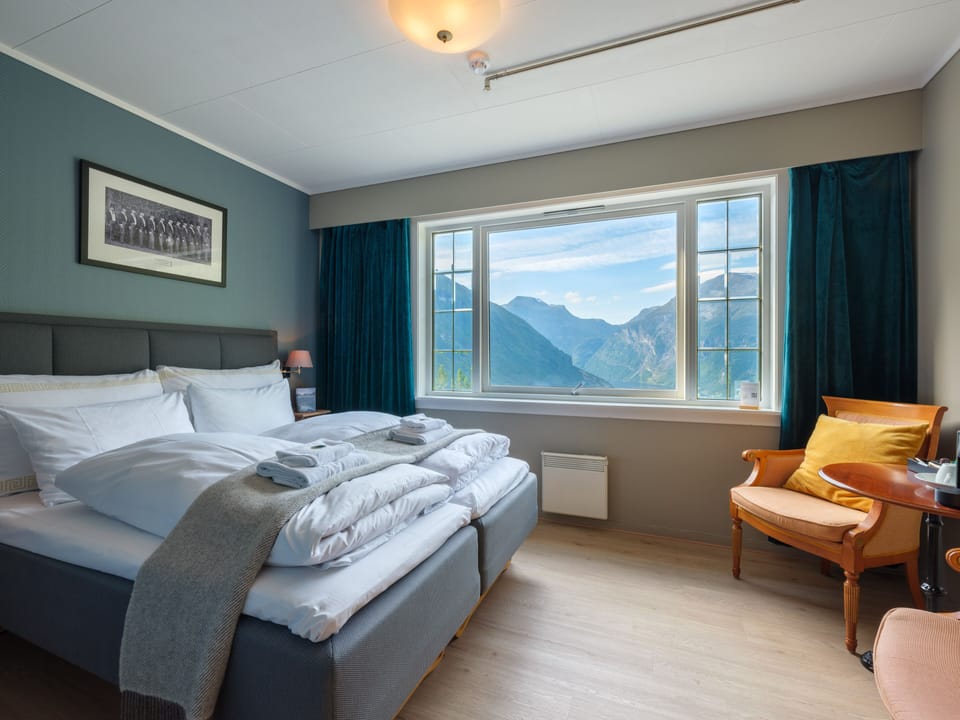 Double Room, Sea View | Down comforters, iron/ironing board, free WiFi, bed sheets