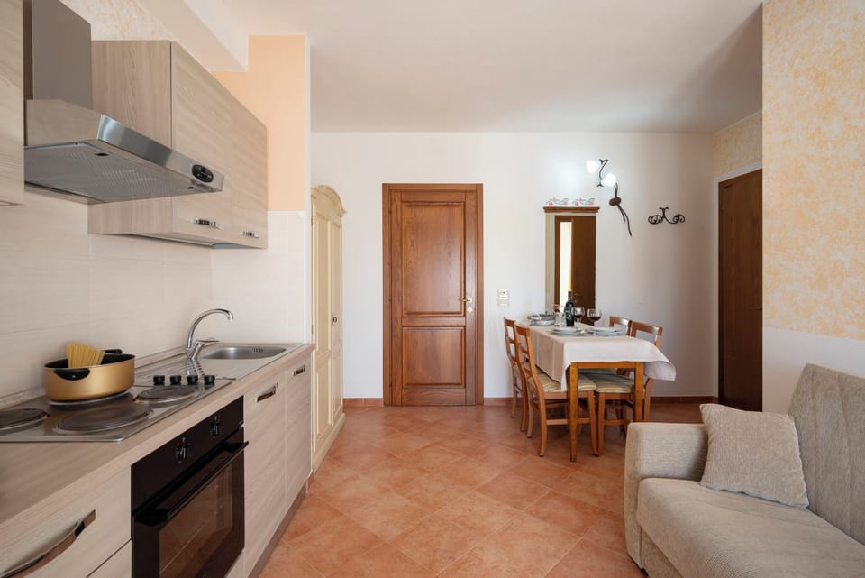 Comfort Apartment, 1 Bedroom, Balcony, Sea View | Living area | 24-inch flat-screen TV with digital channels