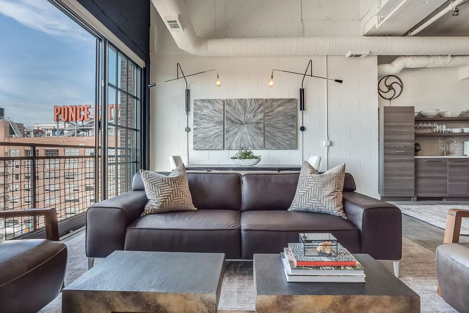 Sofa, Arm Chairs, Coffee Table, Dining Table, Chairs, and Lamps.