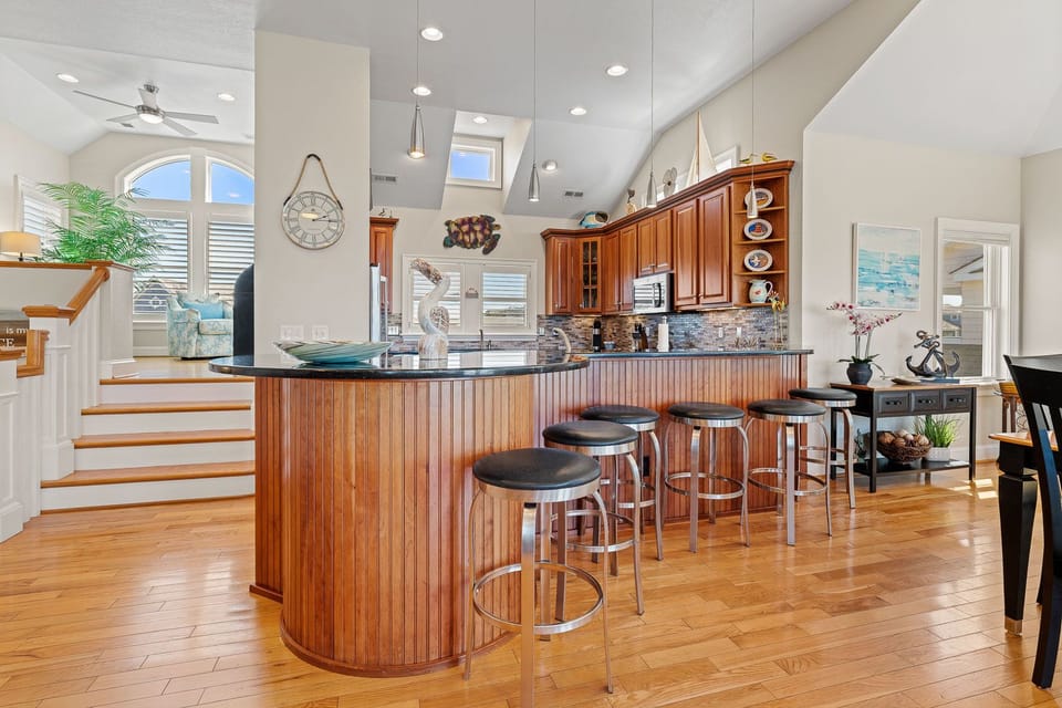 Large Kitchen with Bar Seating on Third Level