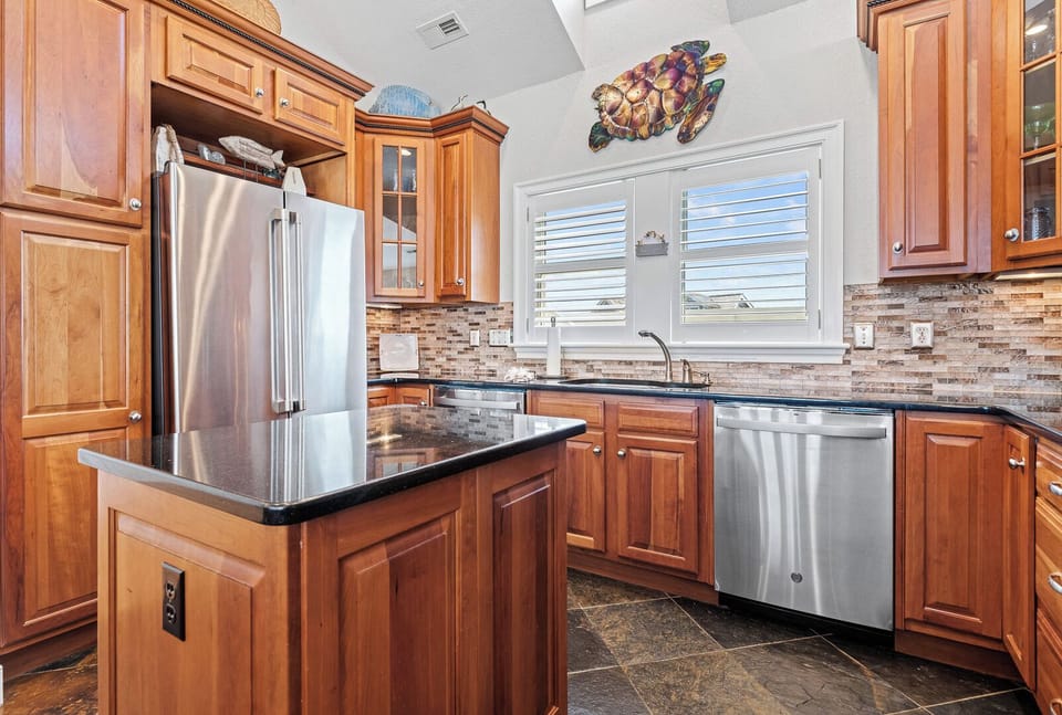 Large Kitchen with Bar Seating on Third Level