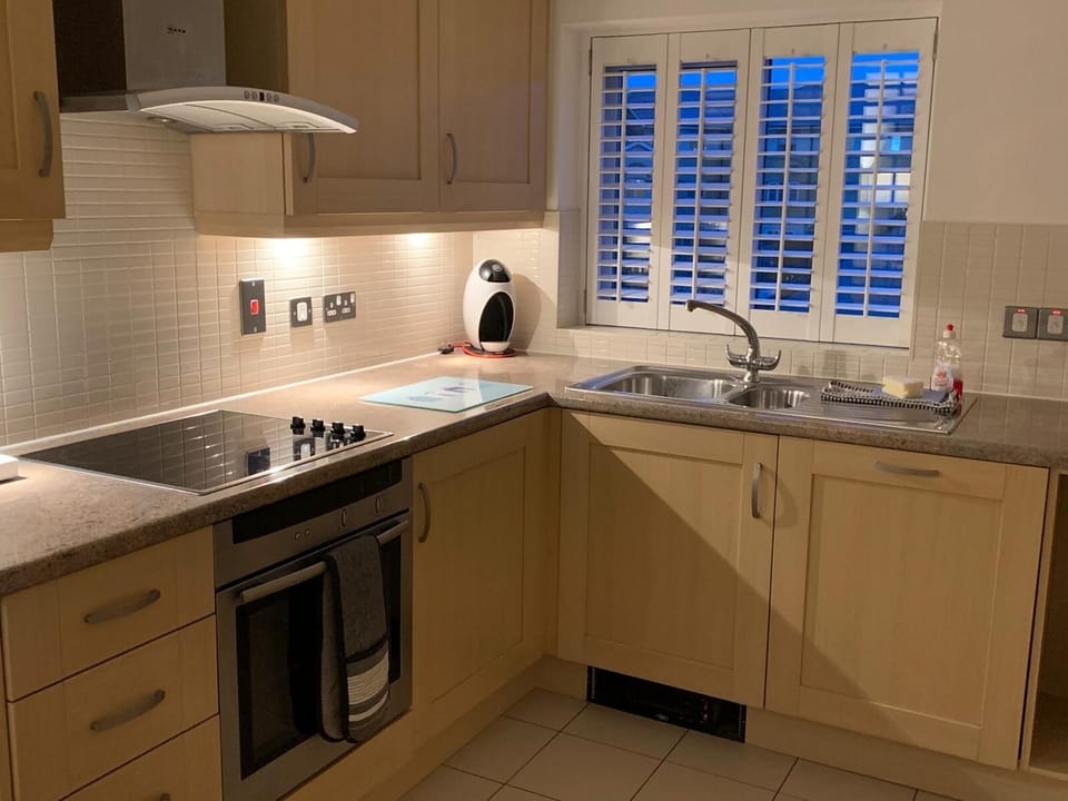 Our fully equipped kitchen with plantation shutters 