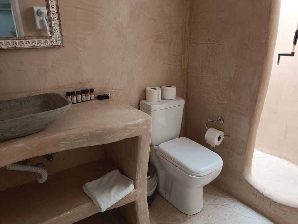 Superior Room | Bathroom | Shower, hair dryer, towels