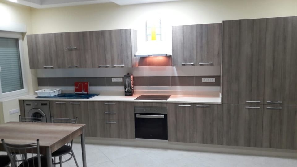 Classic Apartment, 3 Bedrooms | Private kitchen | Full-size fridge, microwave, oven, electric kettle